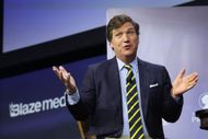 Tucker Carlson speaks to guests at the Family Leadership Summit on July 14, 2023 (Image via Getty)